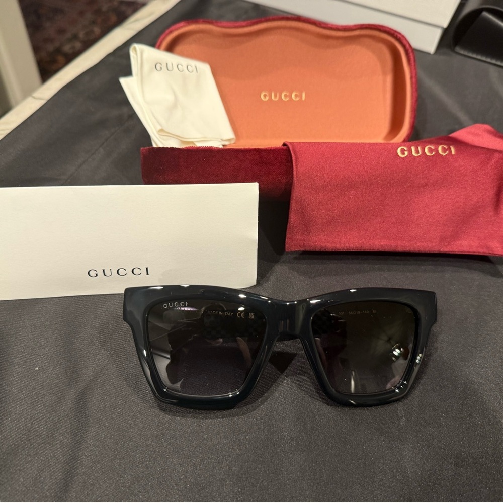 Gucci GG1714S cat-eye sunglasses with a black frame and solid grey lenses - Picture 6 of 15